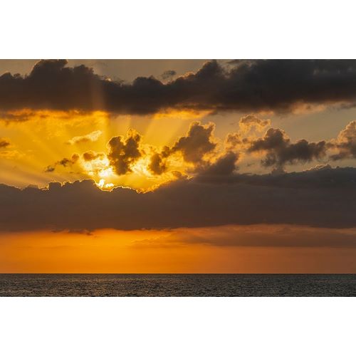 Sunset in clouds over ocean La Boca-Cuba